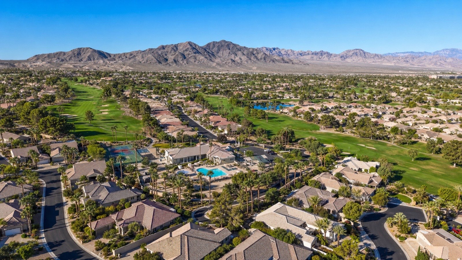 Aerial of the Las Vegas valley at golden hour, one of two Southwest metros relocating buyers compare
